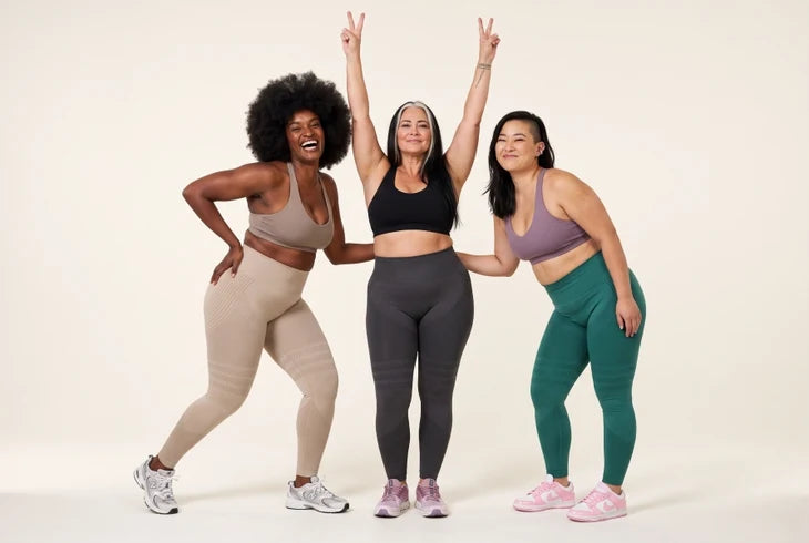 Three women wearing beige, grey and teal Nolvana leggings